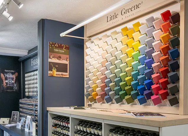 Wall of Little Greene colour swatches inside the Ashley & Lewis shop